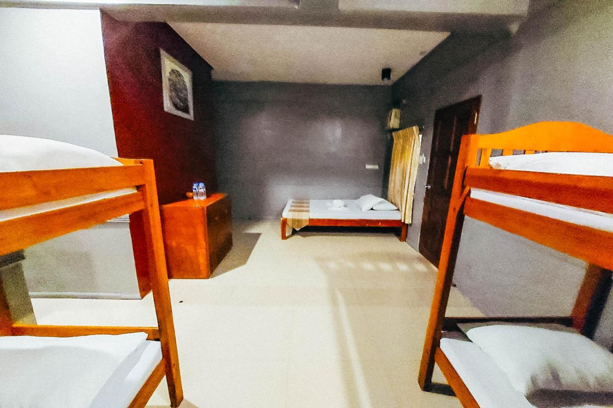 Mbg Travellers Inn Powered By Cocotel Puerto Princesa Zimmer foto