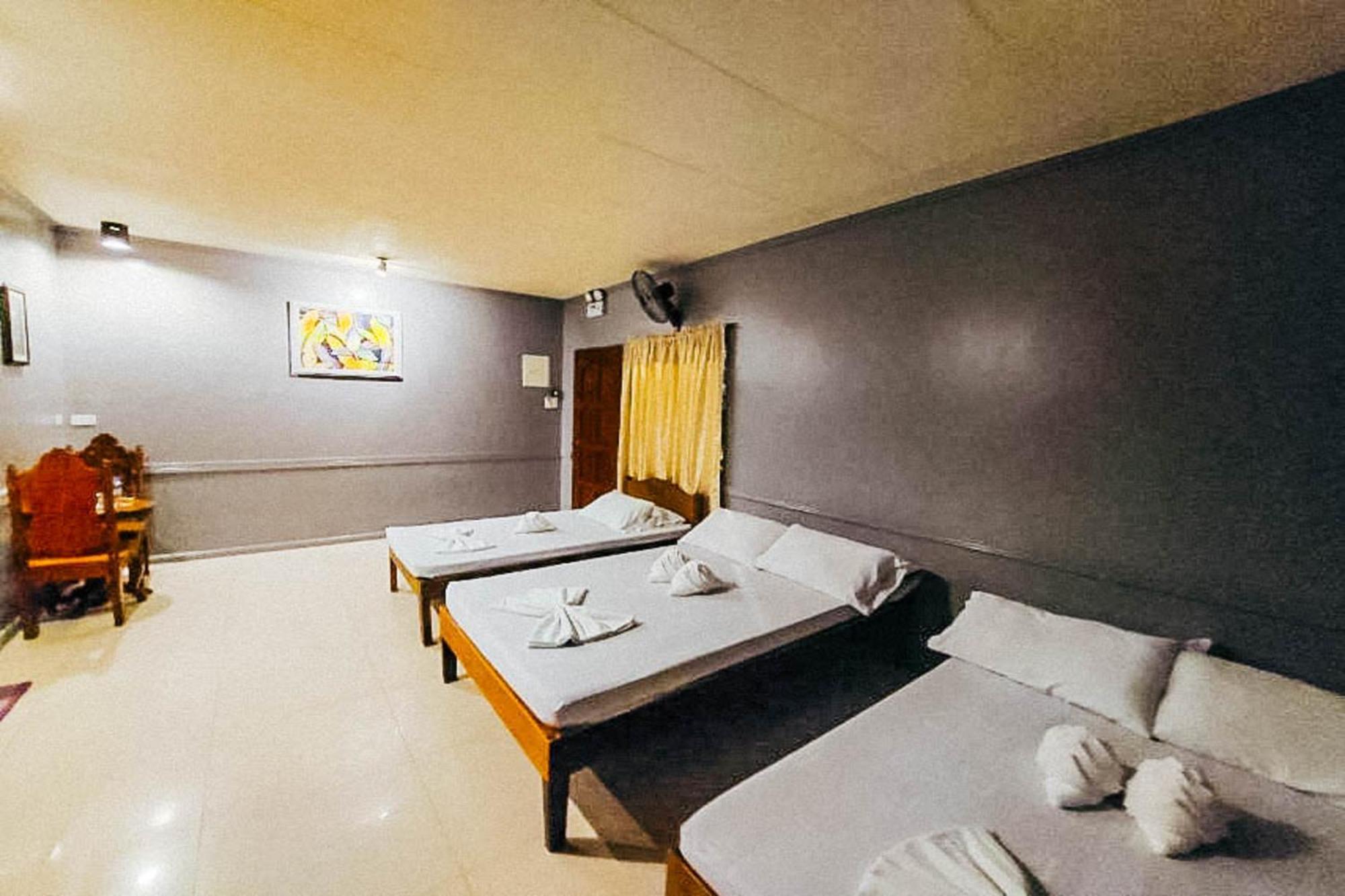 Mbg Travellers Inn Powered By Cocotel Puerto Princesa Zimmer foto
